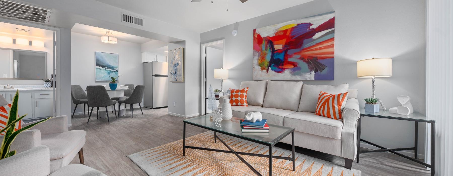 a living room with a couch and a table